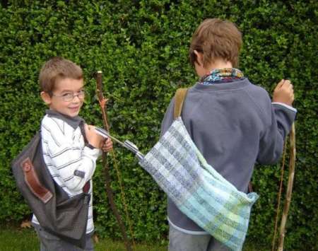 Homeschooling Boys with their bows and arrows